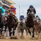 kentucky derby 2025 horses bursting out of the gate at Churchill Downs