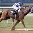 Secretariat crossing the finish line at the Kentucky Derby, a historic moment for fastest Kentucky Derby times