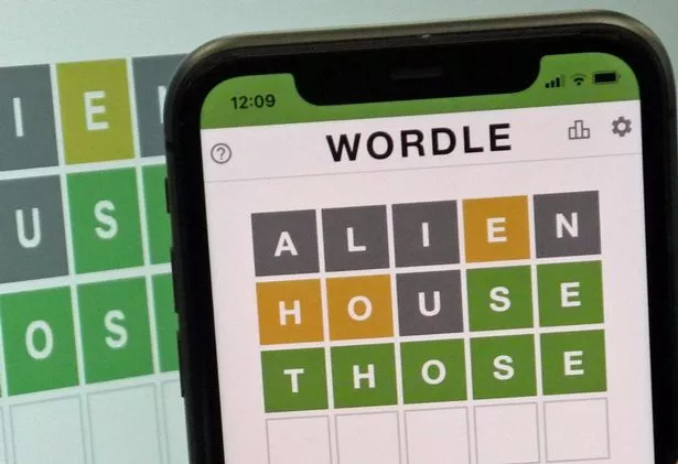 Person solving today's Wordle puzzle on a mobile device.