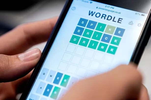 Player attempting Wordle May 20 puzzle on a smartphone