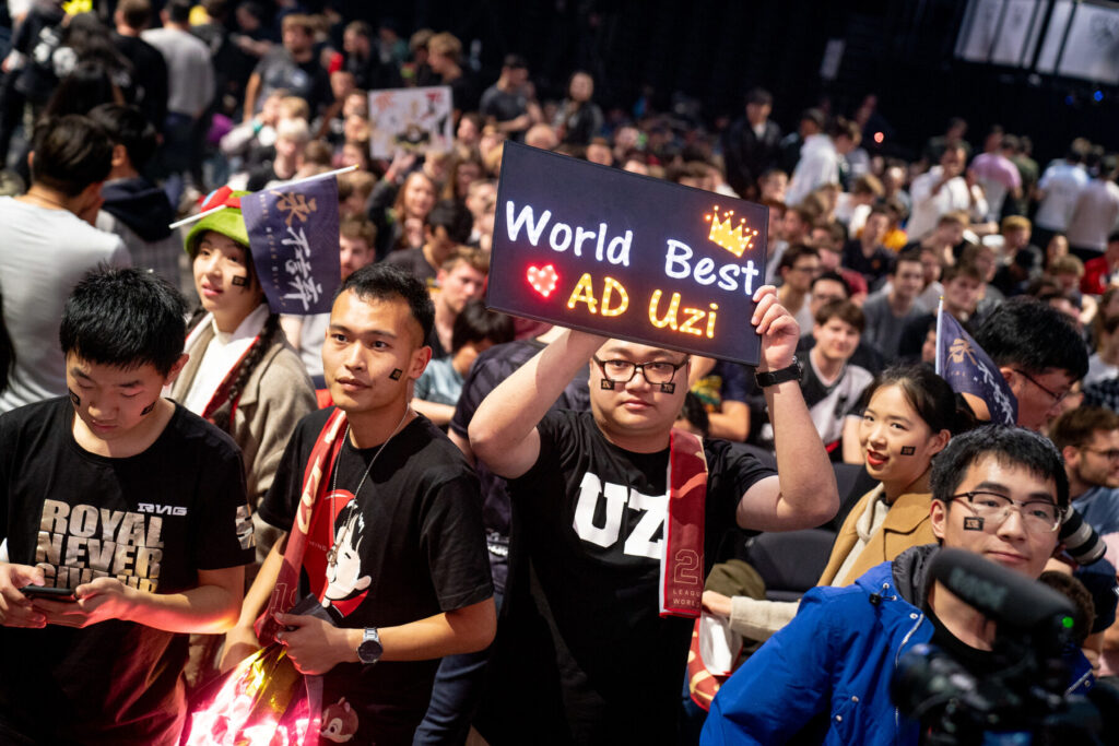 Uzi at a major League of Legends event, celebrated by fans